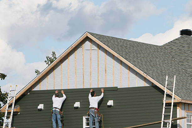 Professional Siding technician working in Brevard, NC